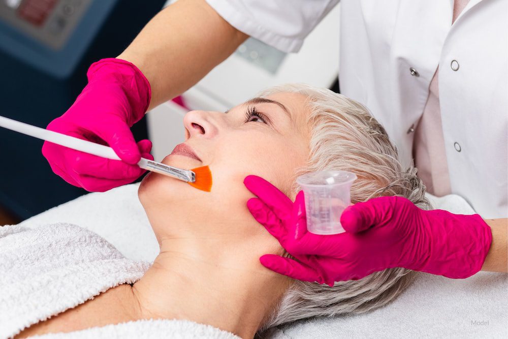 Woman getting a chemical peel.